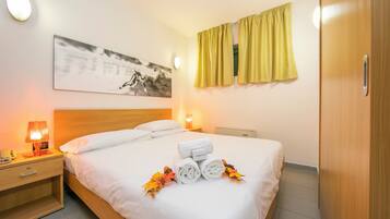 Apartamento familiar, varias habitaciones (Teleo 106 Ski In - Ski Out 50m) | 1 dormitorio y ropa de cama