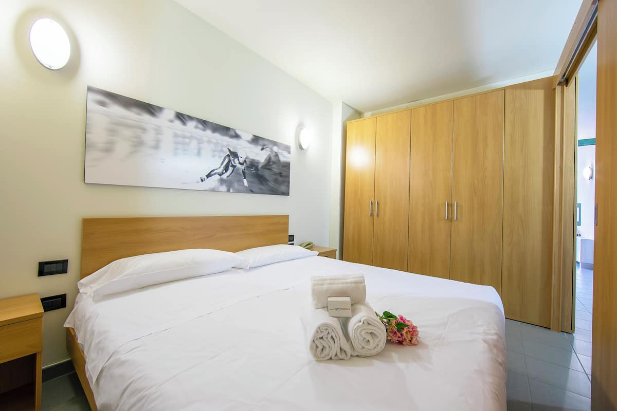 1 habitación y ropa de cama