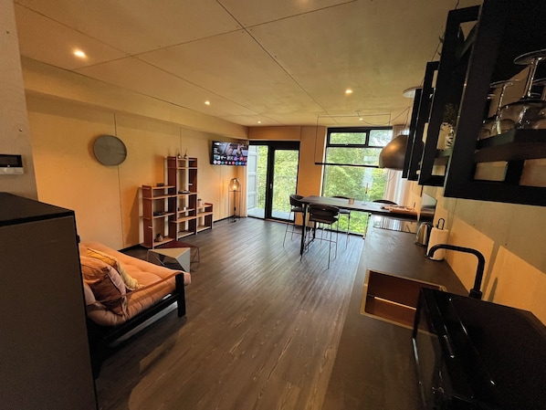 Deluxe Studio | Living area | 42-inch Smart TV with digital channels, pay films, streaming services