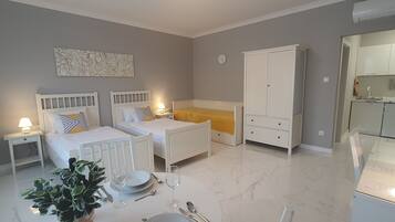 Studio | 6 bedrooms, in-room safe, individually decorated, individually furnished