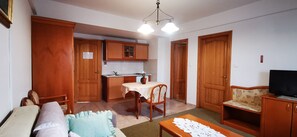 Habitación cuádruple familiar | Zona de estar