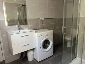 Shower, eco-friendly toiletries, hair dryer, towels
