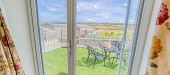 Ty Gwair -  a cosy fire that sleeps 4 guests  in 2 bedrooms