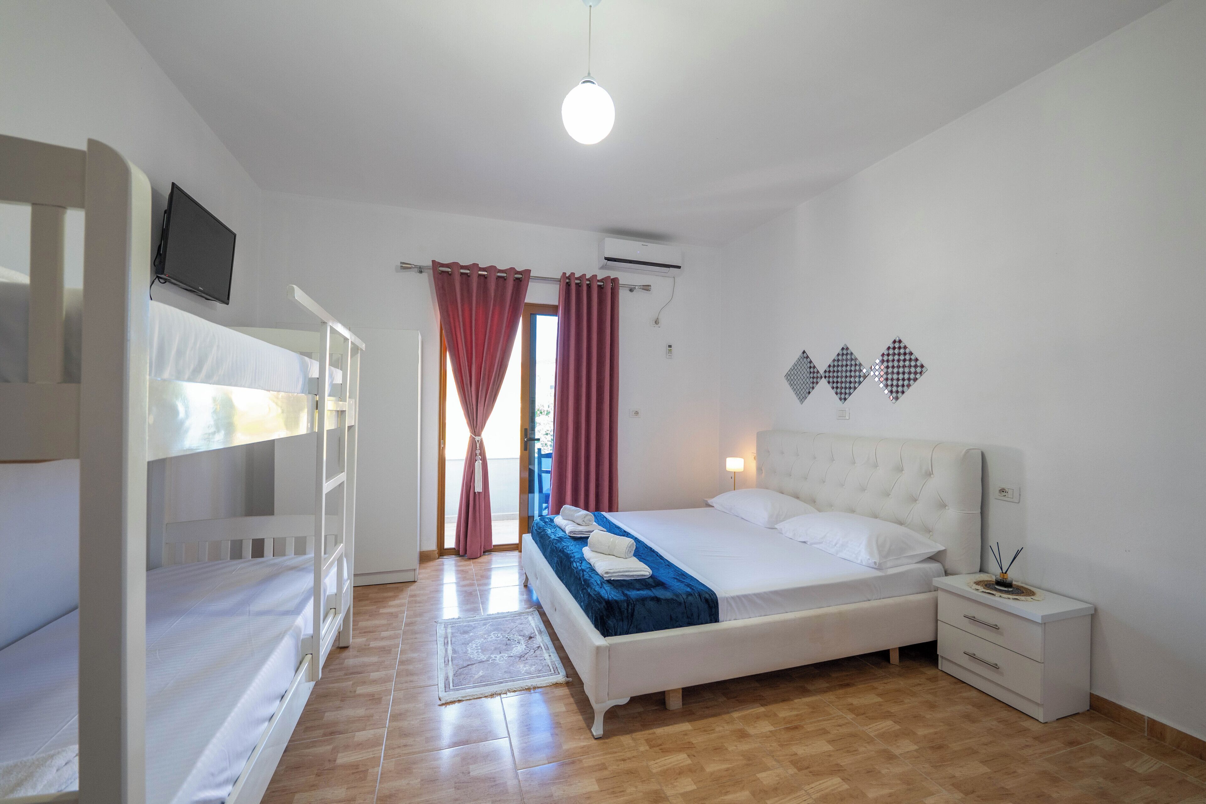 Quadruple Room, Sea View | Desk, free WiFi, bed sheets