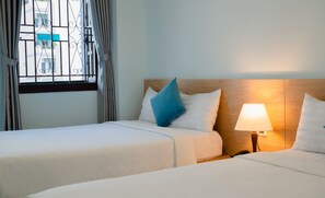 Deluxe Quadruple Room | In-room safe, desk, blackout curtains, iron/ironing board - StarLight Nha Trang (Nha Trang)