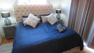 3 kamar tidur, setrika/meja setrika, Wi-Fi gratis, dan seprai linen