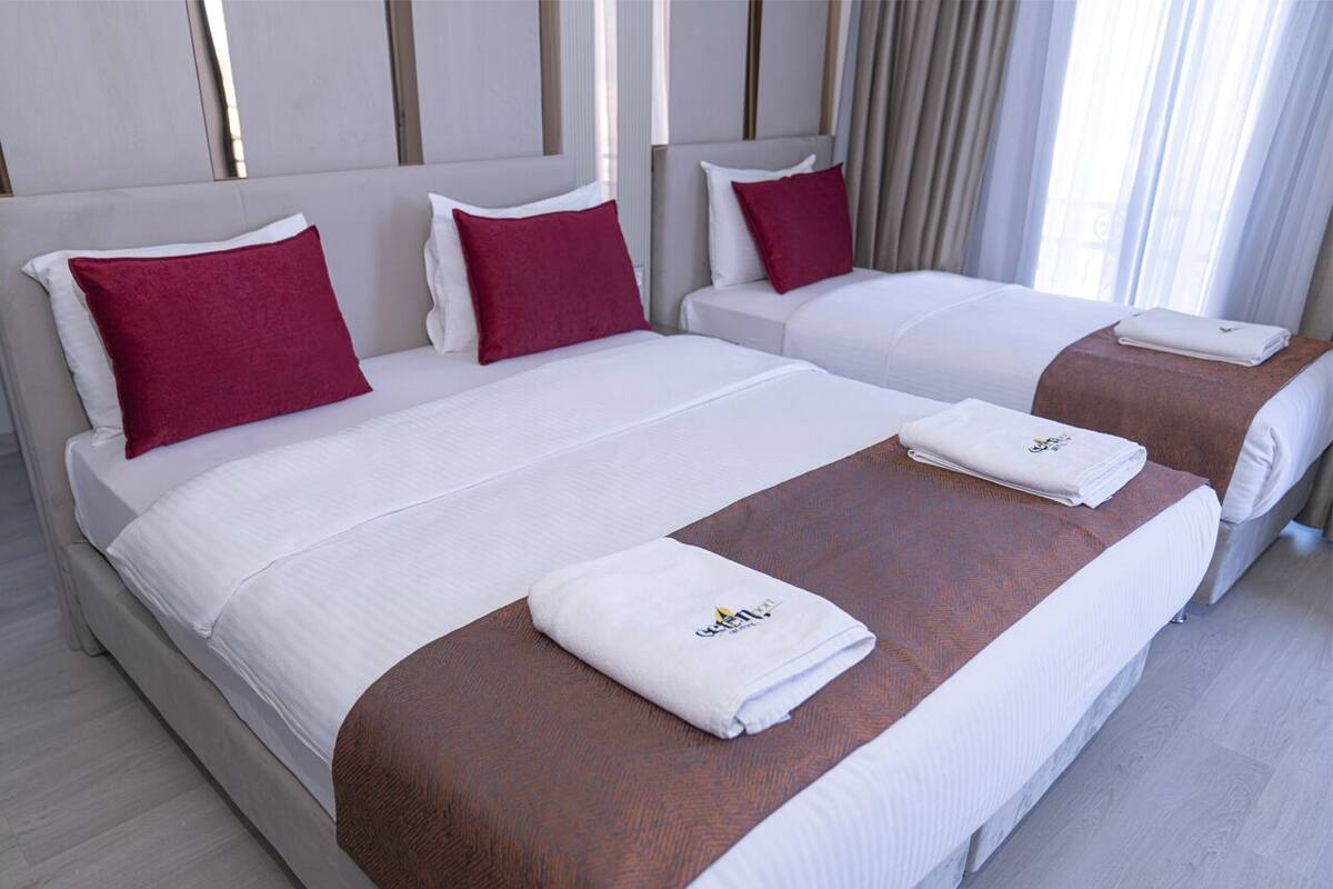Suite Deluxe | Draps en coton égyptien, literie de qualité supérieure, minibar