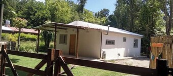 Campos de Dios Cabin between streams and mountains