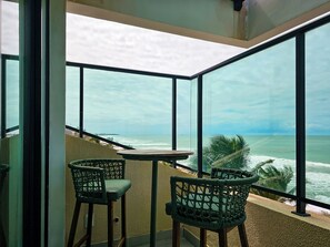 Luxury Triple Room, Sea View | Minibar, in-room safe, blackout drapes, soundproofing