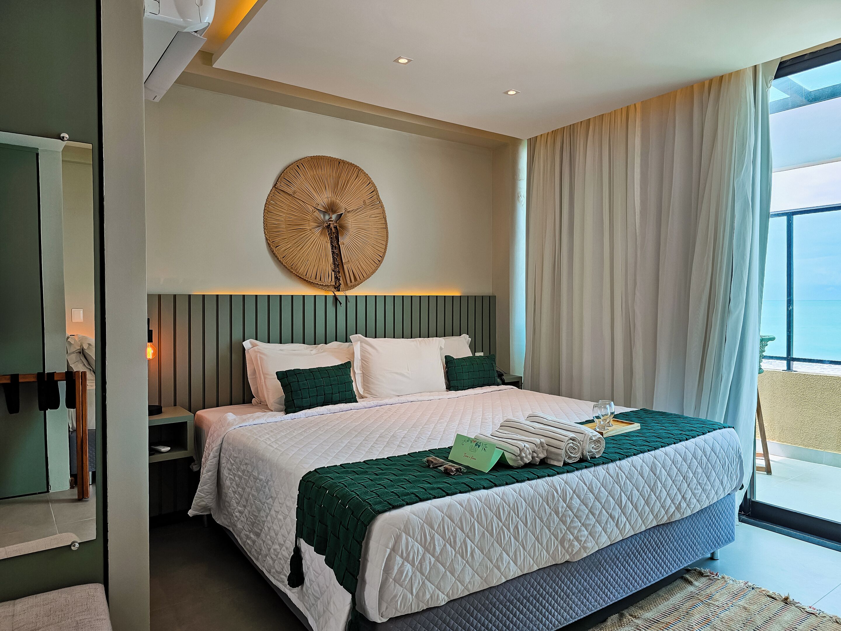 Luxury Triple Room, Sea View | Minibar, in-room safe, blackout drapes, soundproofing