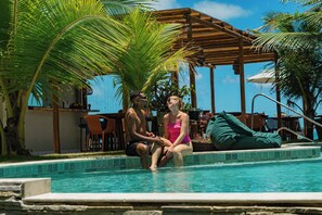 Outdoor pool, open 7:00 AM to 9:30 PM, pool umbrellas, sun loungers