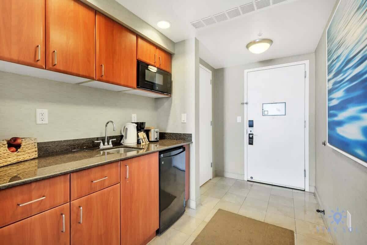 Coffee/tea maker, mini-fridge, microwave, toaster
