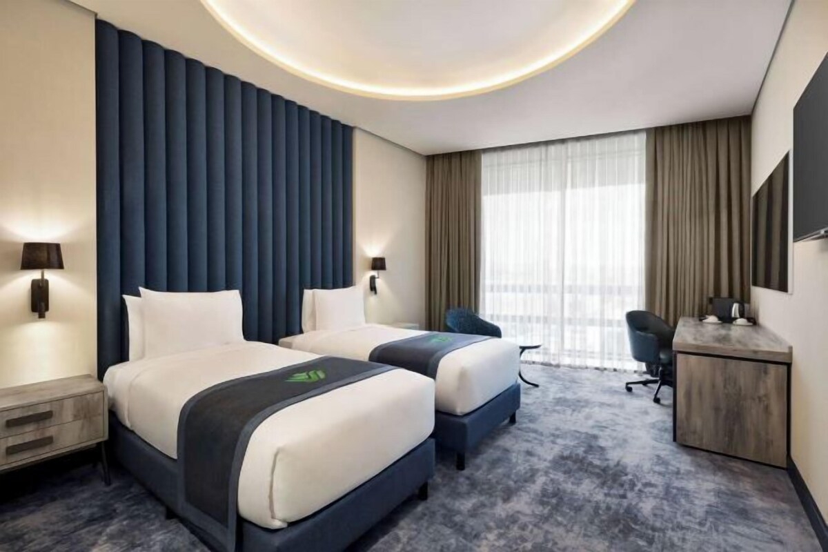 Hypoallergeen beddengoed, een minibar, een kluis op de kamer, een bureau
