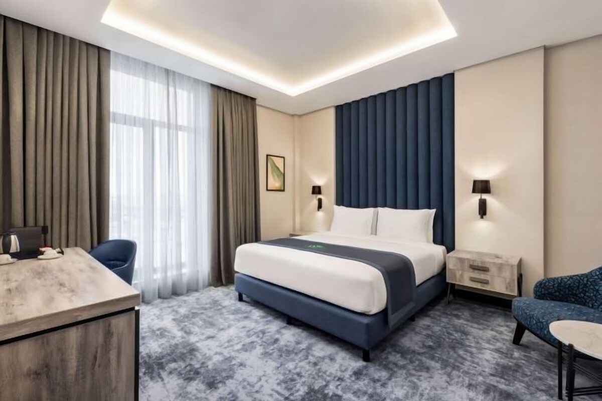 Hypoallergeen beddengoed, een minibar, een kluis op de kamer, een bureau