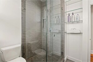 Shower, hair dryer, towels, soap