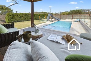 A heated pool - Paradise By The Bay  - Gas Heated Pool, Spa & Waterslide (Rye)