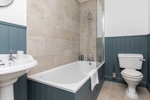 Combined shower/tub, eco-friendly toiletries, hair dryer, towels