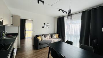 Comfort Apartment | Living area | Smart TV