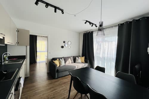 Comfort Apartment | Living area | Smart TV