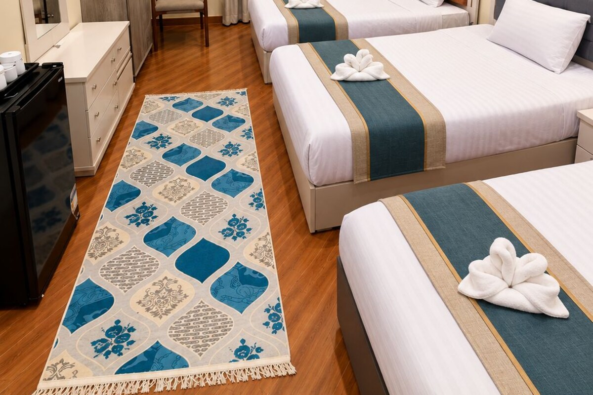 Triple Room, Multiple Beds, Private Bathroom, Tower | Bathroom | Free toiletries, hair dryer, bathrobes, slippers