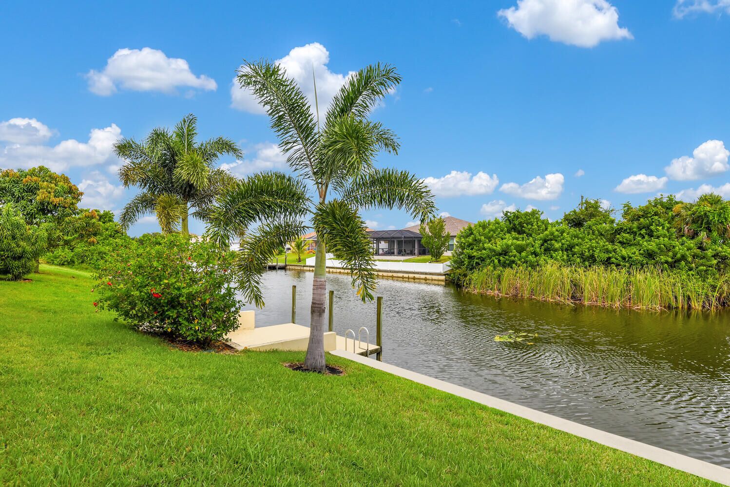 Palm Breeze- Northern Exposure Waterfront Swimming Pool Home