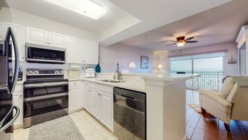 Coffee/tea maker, fridge, microwave, oven