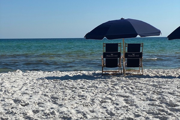 On the beach, sun-loungers