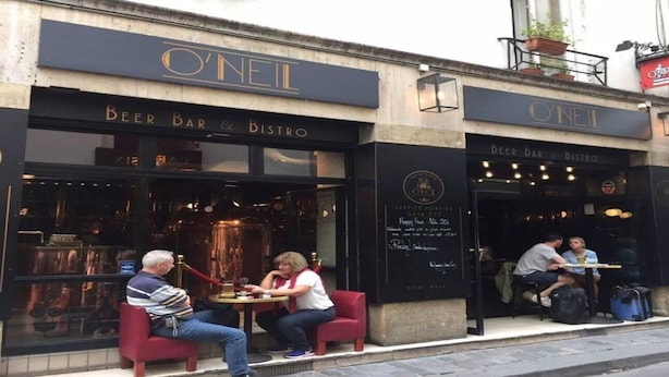 A Beer Bar & Bistro named O'Neill with outdoor seating and a visible beer tap.