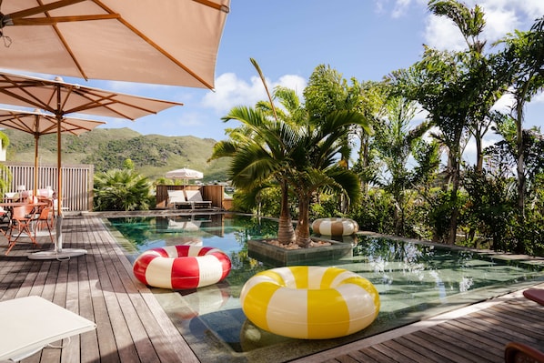 Outdoor pool, pool umbrellas, pool loungers