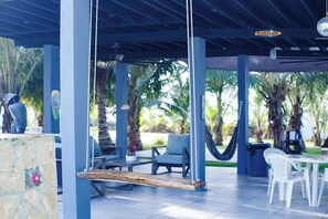 Outdoor dining - Oceanfront Villa w/2 Pools + water slide & Tennis/Pickleball Court (Vega Baja)