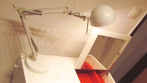A white desk with a mirror, a lamp, and a red drawer. - TRAVELLER FRIENDLY APARTMENT IN SUNNY PULA CITY IN BEAUTIFUL ISTRIAN COUNTY (Pula)