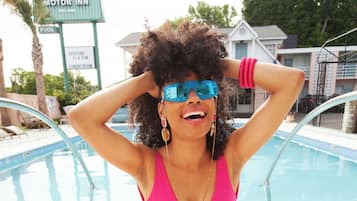 Outdoor pool, open 8:00 AM to 6:00 PM, pool umbrellas, sun loungers