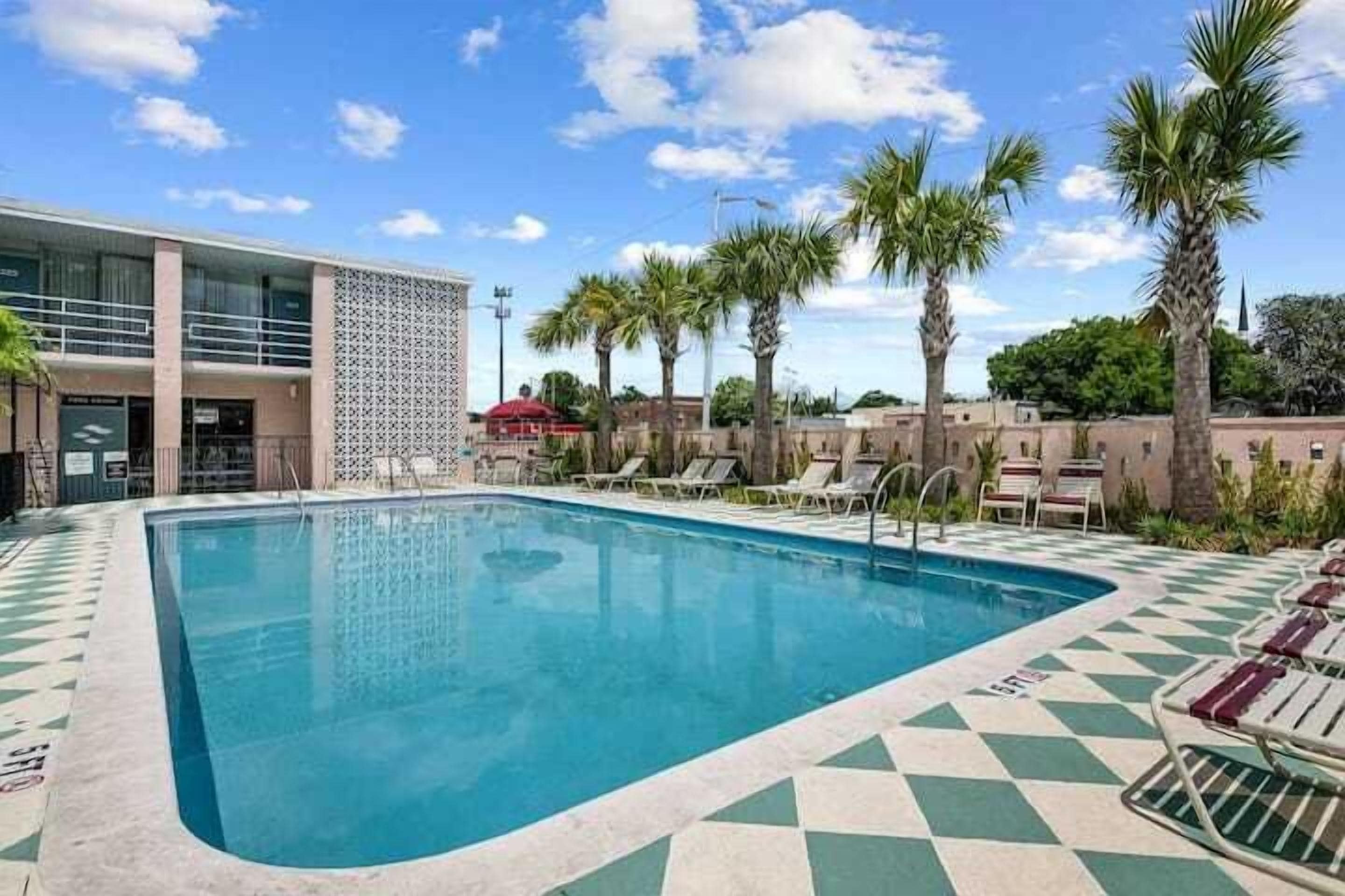 Outdoor pool, open 8:00 AM to 6:00 PM, pool umbrellas, sun loungers