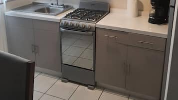 Fridge, microwave, oven, coffee/tea maker