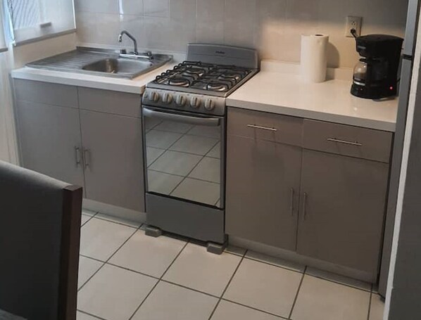 Fridge, microwave, oven, coffee/tea maker
