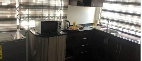 Fridge, microwave, stovetop, electric kettle