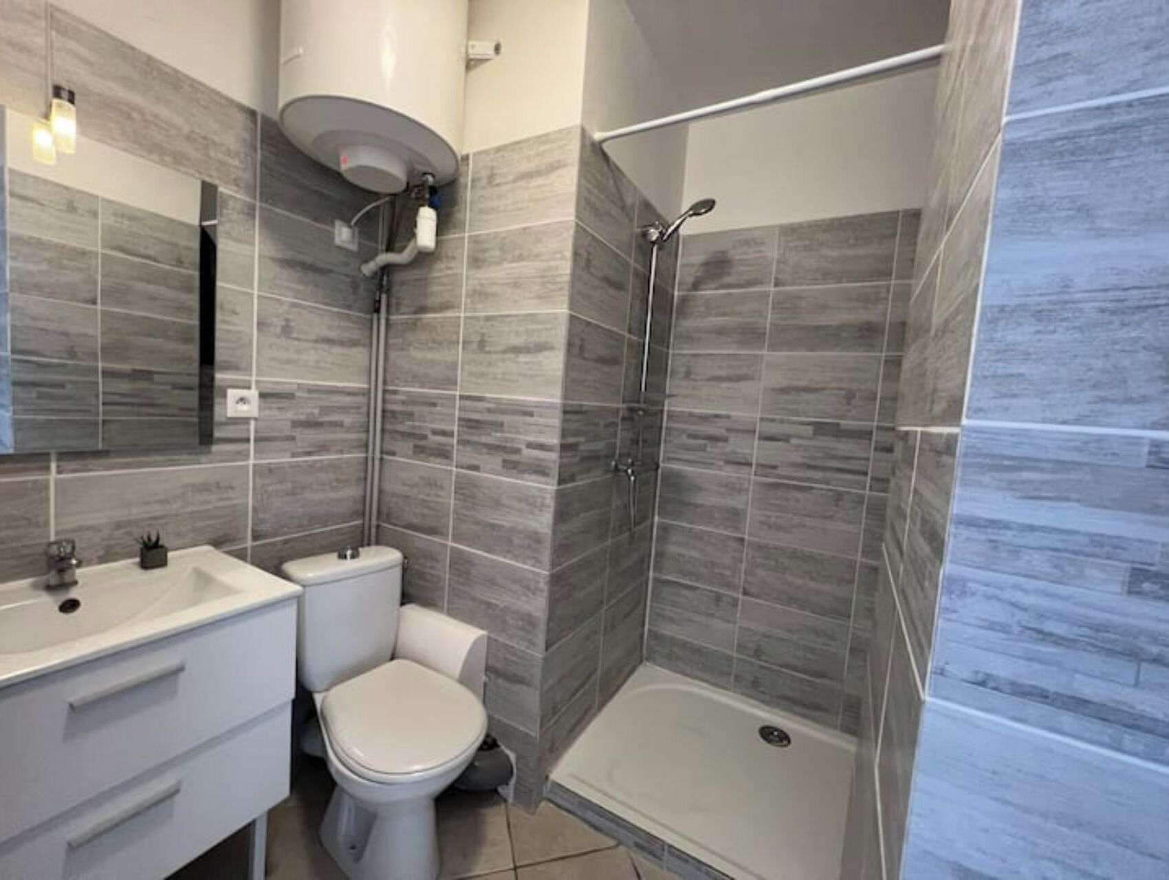 Shower, eco-friendly toiletries, hair dryer, towels