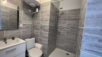 Shower, eco-friendly toiletries, hair dryer, towels