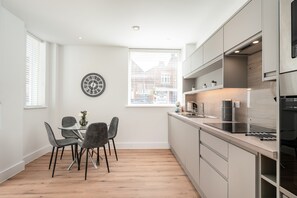 Standard Apartment | Private kitchen | Full-size fridge, microwave, oven, stovetop