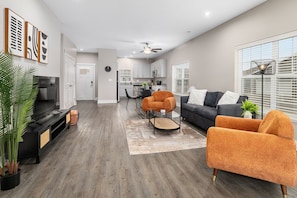 Standard Condo | Living area | 55-inch Smart TV with digital channels, TV, streaming services - The Reserve Flats (Grandville)