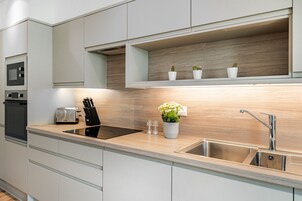 Superior Apartment | Private kitchen | Full-size fridge, microwave, oven, stovetop