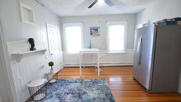 Basic Apartment, 3 Bedrooms | Living area | 30-inch flat-screen TV with cable channels, TV