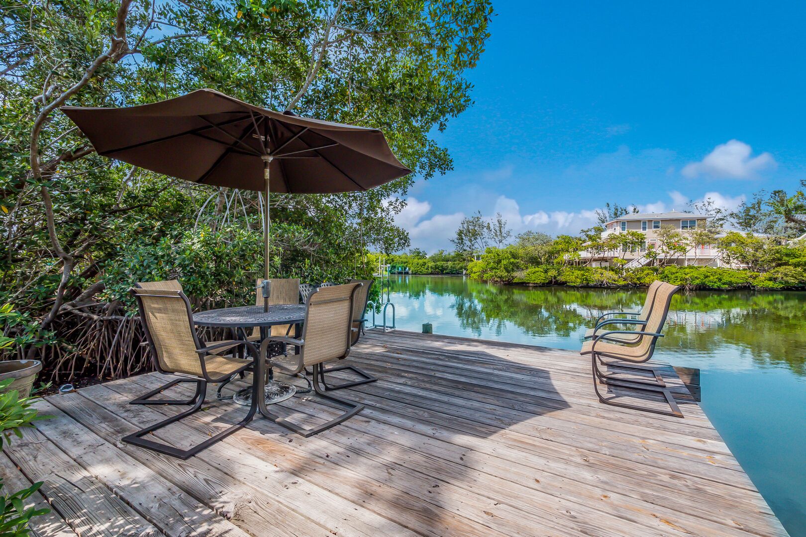 Serenity Cove: North End Cottage on Canal, Kayaks, Perfect for 2 by Anna Maria Life Vacation Rentals