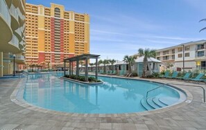 A heated pool, sun loungers