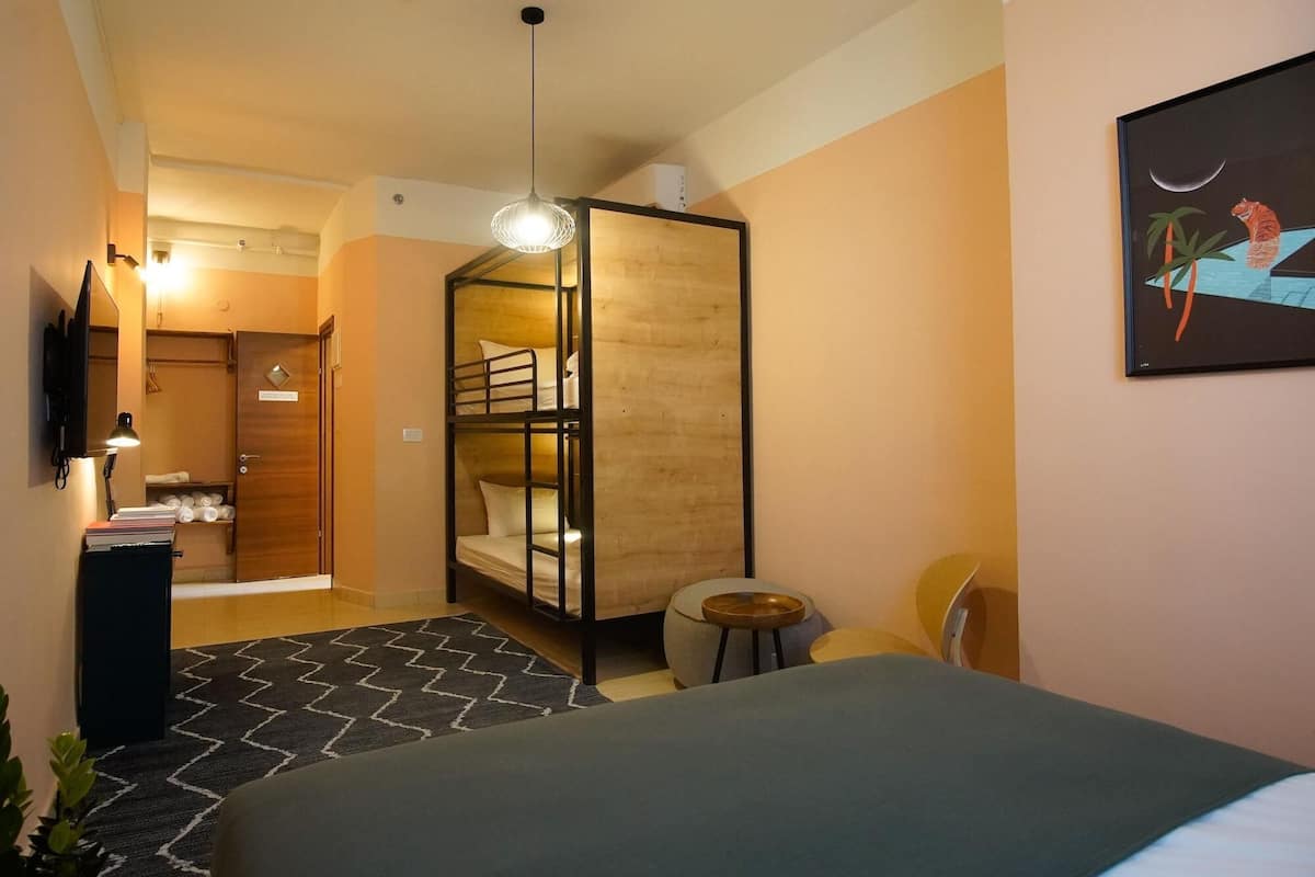 Desk, laptop workspace, WiFi (free), bed sheets