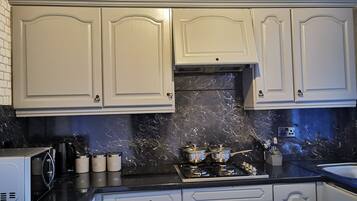 House, Multiple Beds | Private kitchen | Fridge, microwave, stovetop, electric kettle