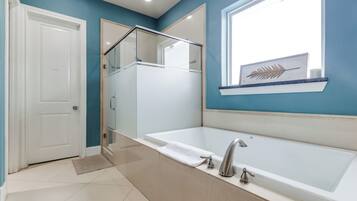 Combined shower/tub, hair dryer, towels, soap