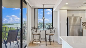 Condo, 2 Bedrooms | Private kitchen | Oven, dishwasher, dining tables - Bahia Del Mar by Sandy Beach Vacation Rentals (St. Petersburg)