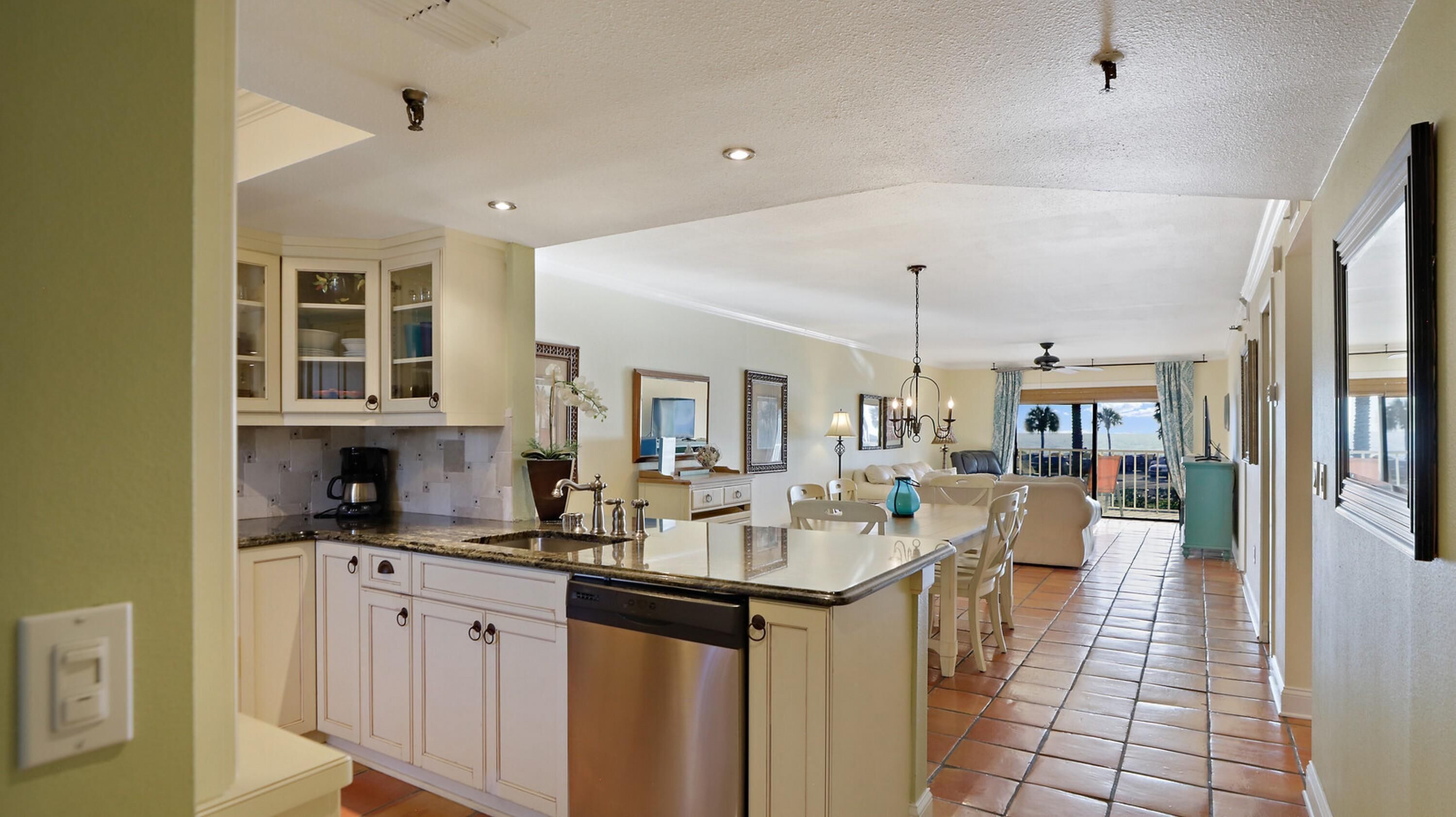 Condo, 2 Bedrooms | Private kitchen | Oven, dishwasher, dining tables