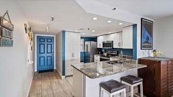 Condo, 2 Bedrooms | Private kitchen | Oven, dishwasher, dining tables